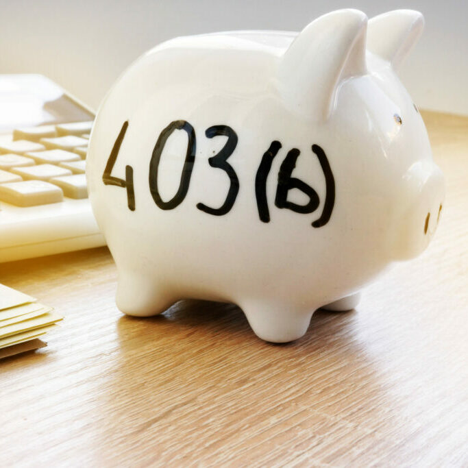 Piggy bank with sign 403b on a side. Retirement plan.