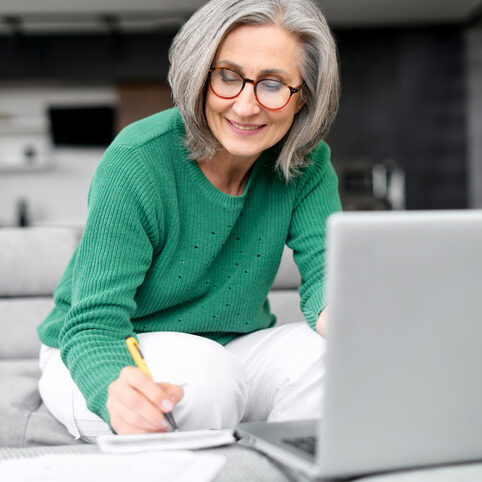 senior woman working on her laptop